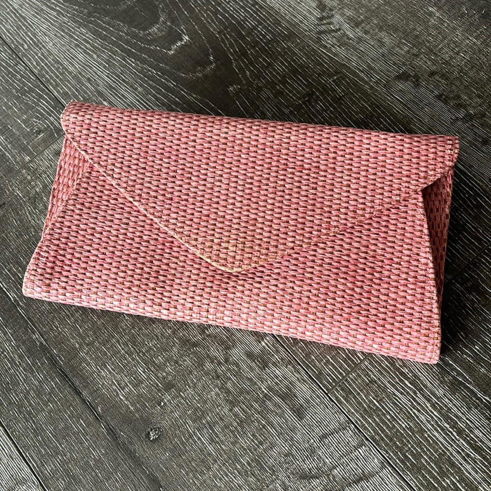 Soft pink raffia clutch